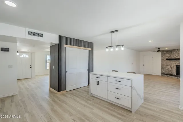 a view of a swimming pool with a yard