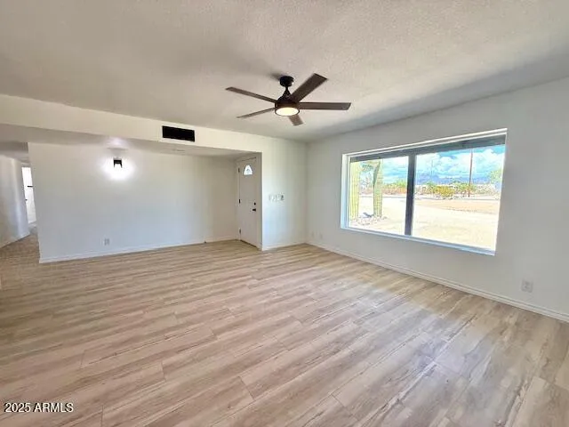 a bathroom with a shower sink and mirror