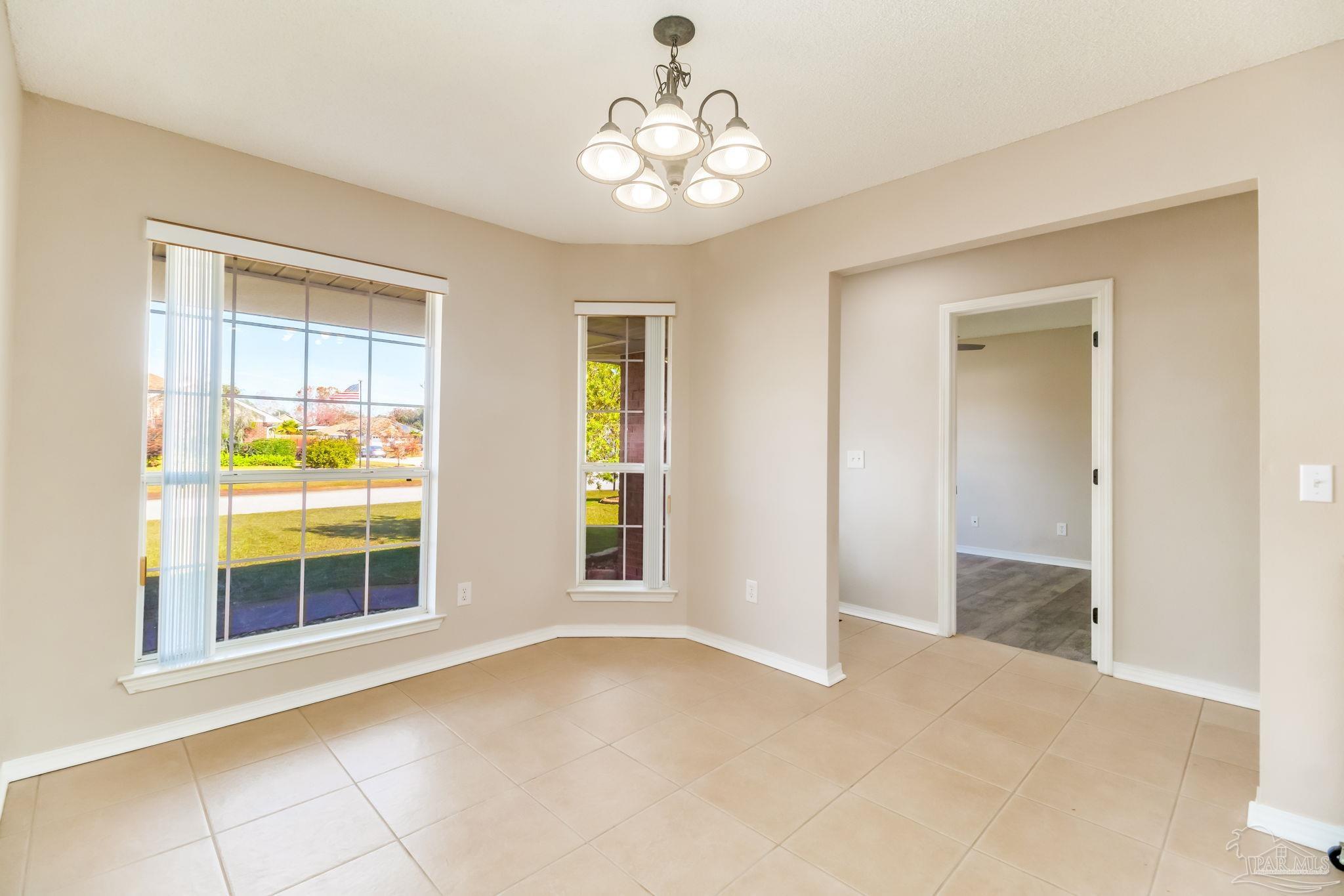 1225 Grand Ridge Circle Gulf Breeze, FL 32563 - Photo 11 of 29 a view of an empty room with window