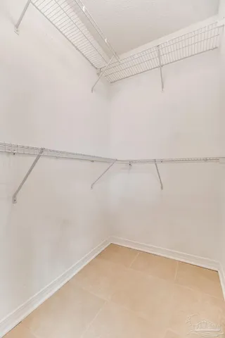 a view of a room with racks on the wall