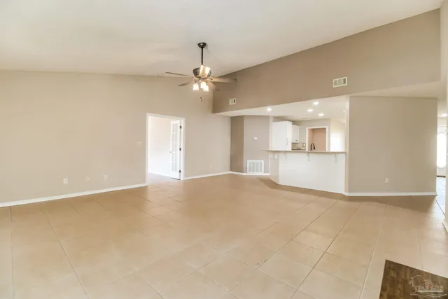 a view of a kitchen with a sink and a stove