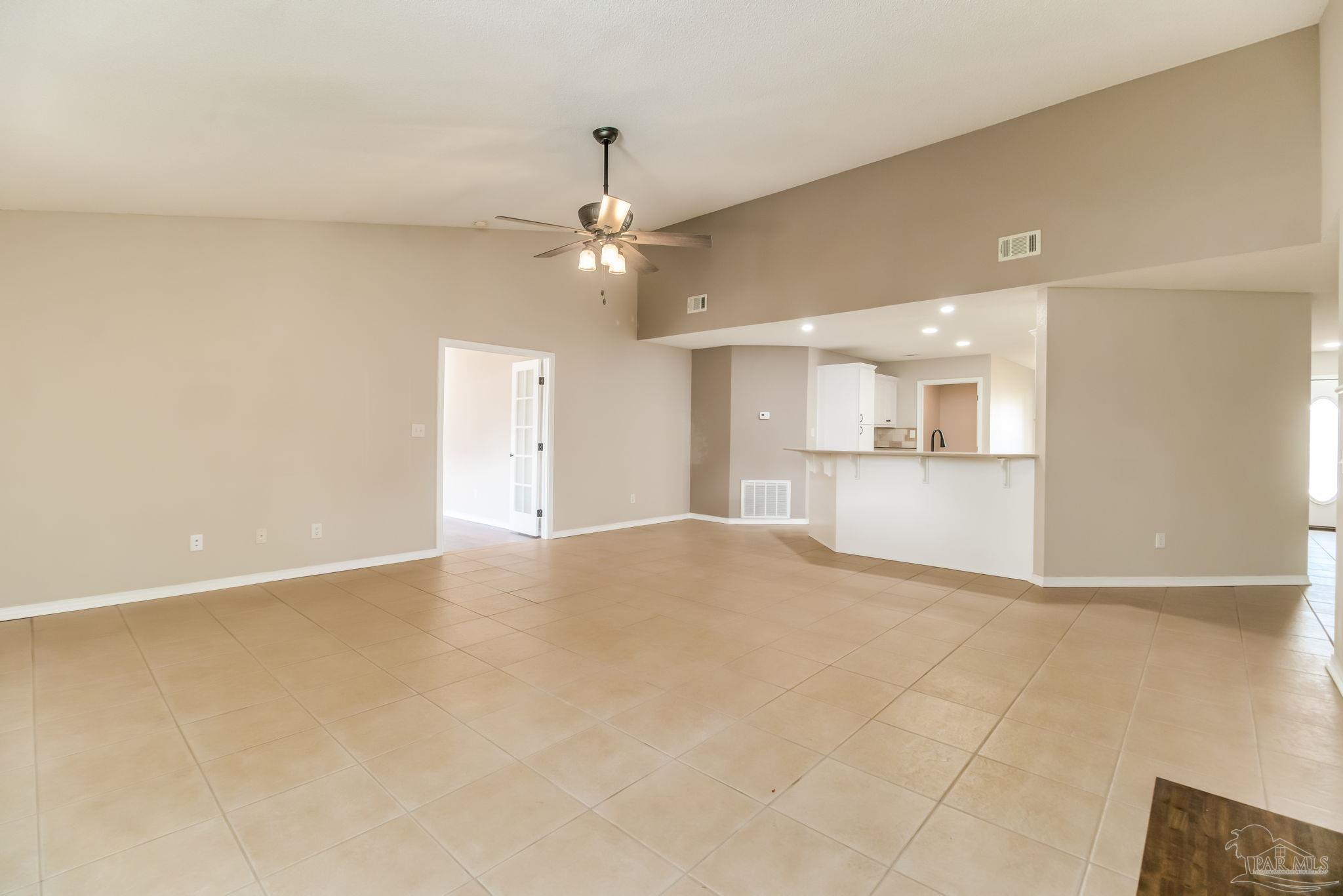 1225 Grand Ridge Circle Gulf Breeze, FL 32563 - Photo 6 of 29 a view of a kitchen with a sink and a stove