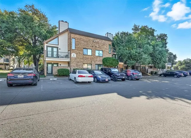 a car parked in front of a house