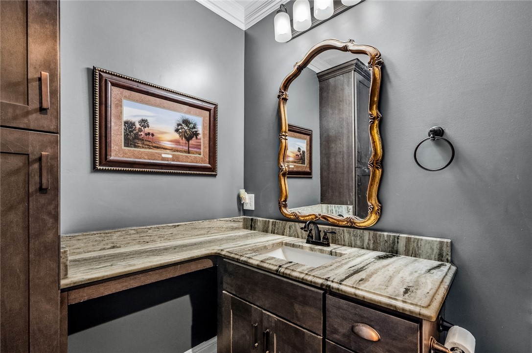 206 James Hare Road Anderson, SC 29626 - Photo 37 of 50 Luxurious vanity with marbled stone counters and a decorative mirror elevates this well-appointed bathroom.