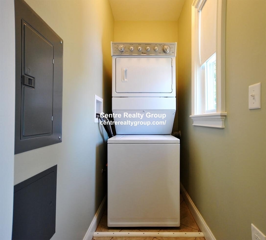 38-40 Turner Street, Unit 2 Boston, MA 02135 - Photo 5 of 6 a utility room with dryer and washer