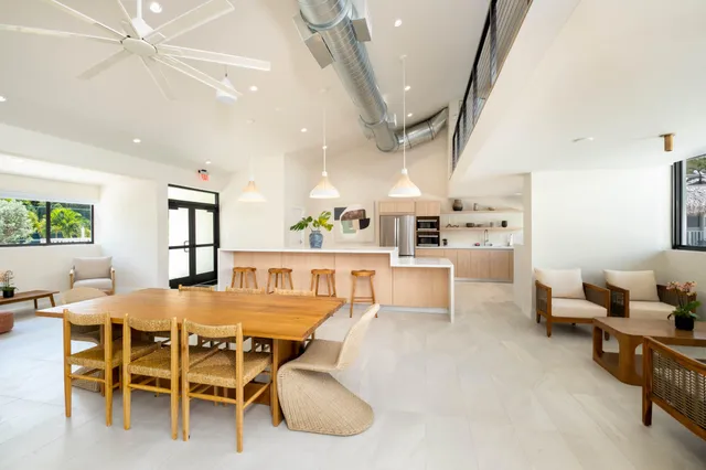 a dining room with furniture and a table