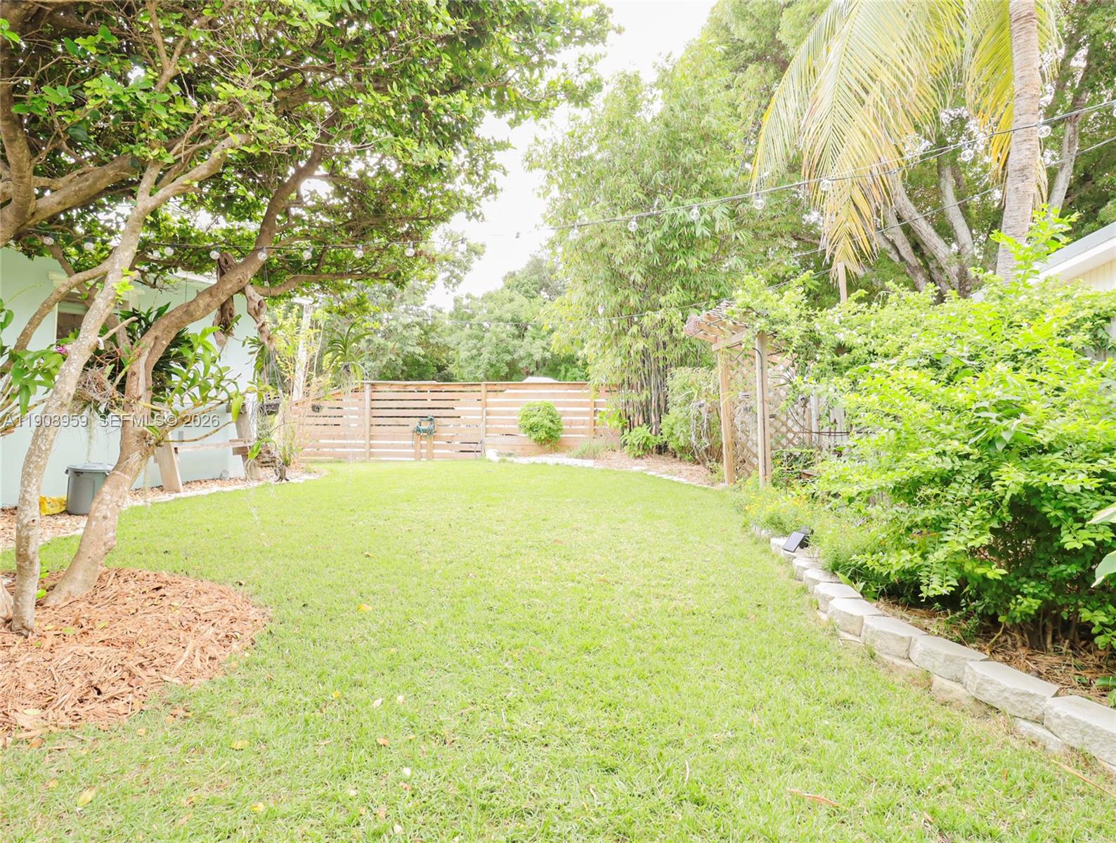 160 Ridge Street Tavernier, FL 33070 - Photo 16 of 24 a swimming pool with an outdoor space and seating area