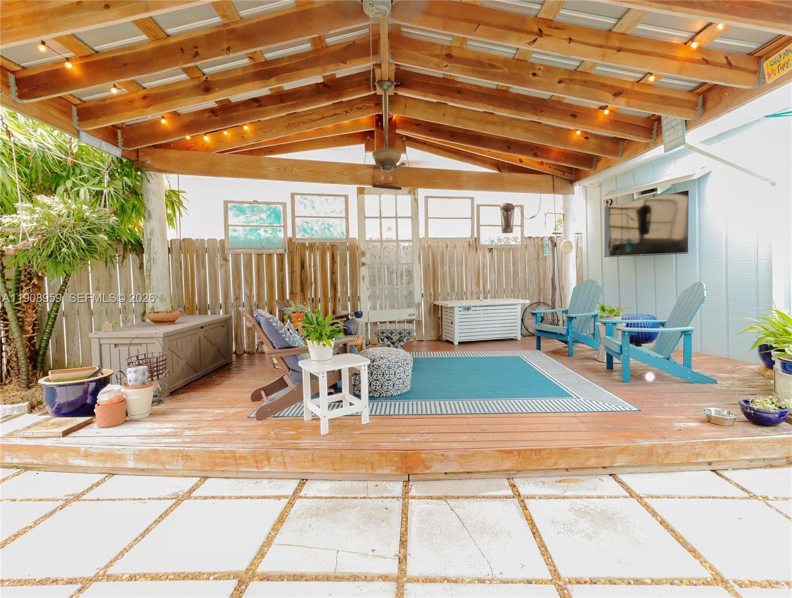160 Ridge Street Tavernier, FL 33070 - Photo 17 of 24 a outdoor space with lots of white furniture and a shower