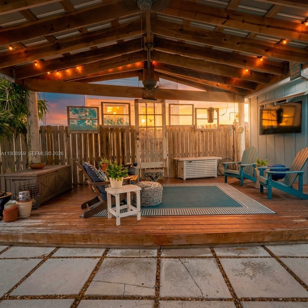160 Ridge Street Tavernier, FL 33070 - Photo 2 of 24 a view of pool table and chairs in patio