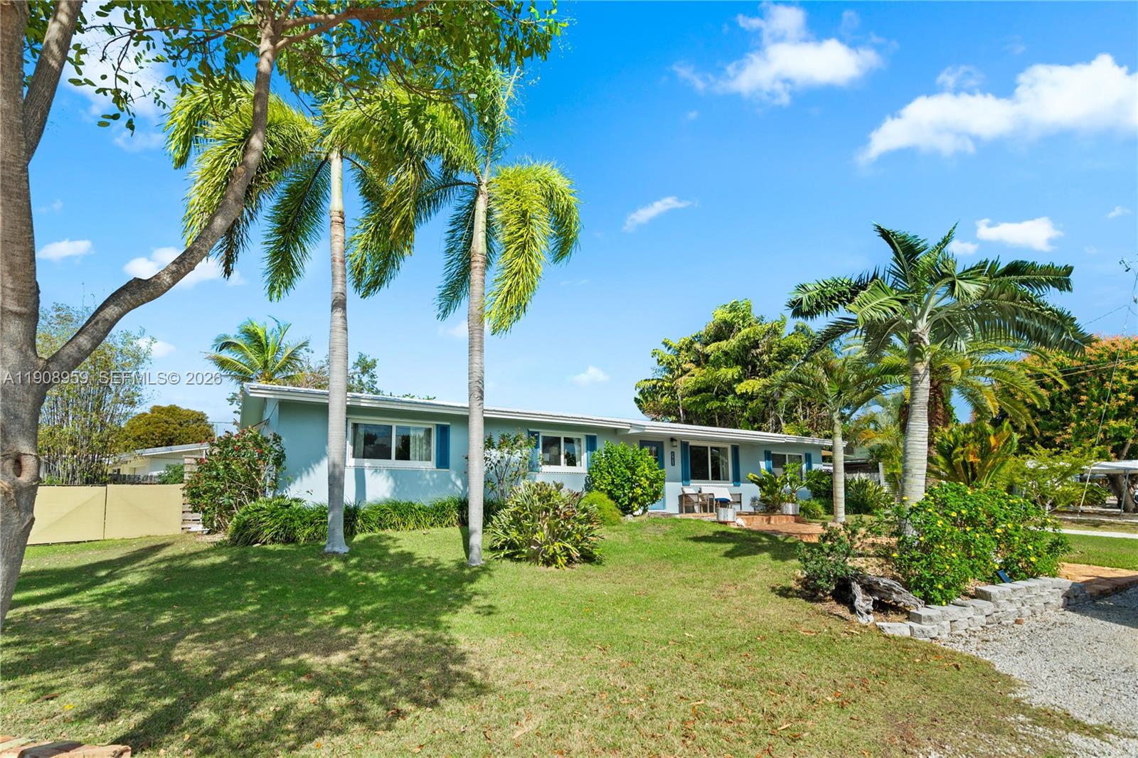 160 Ridge Street Tavernier, FL 33070 - Photo 24 of 24 a front view of a house with garden