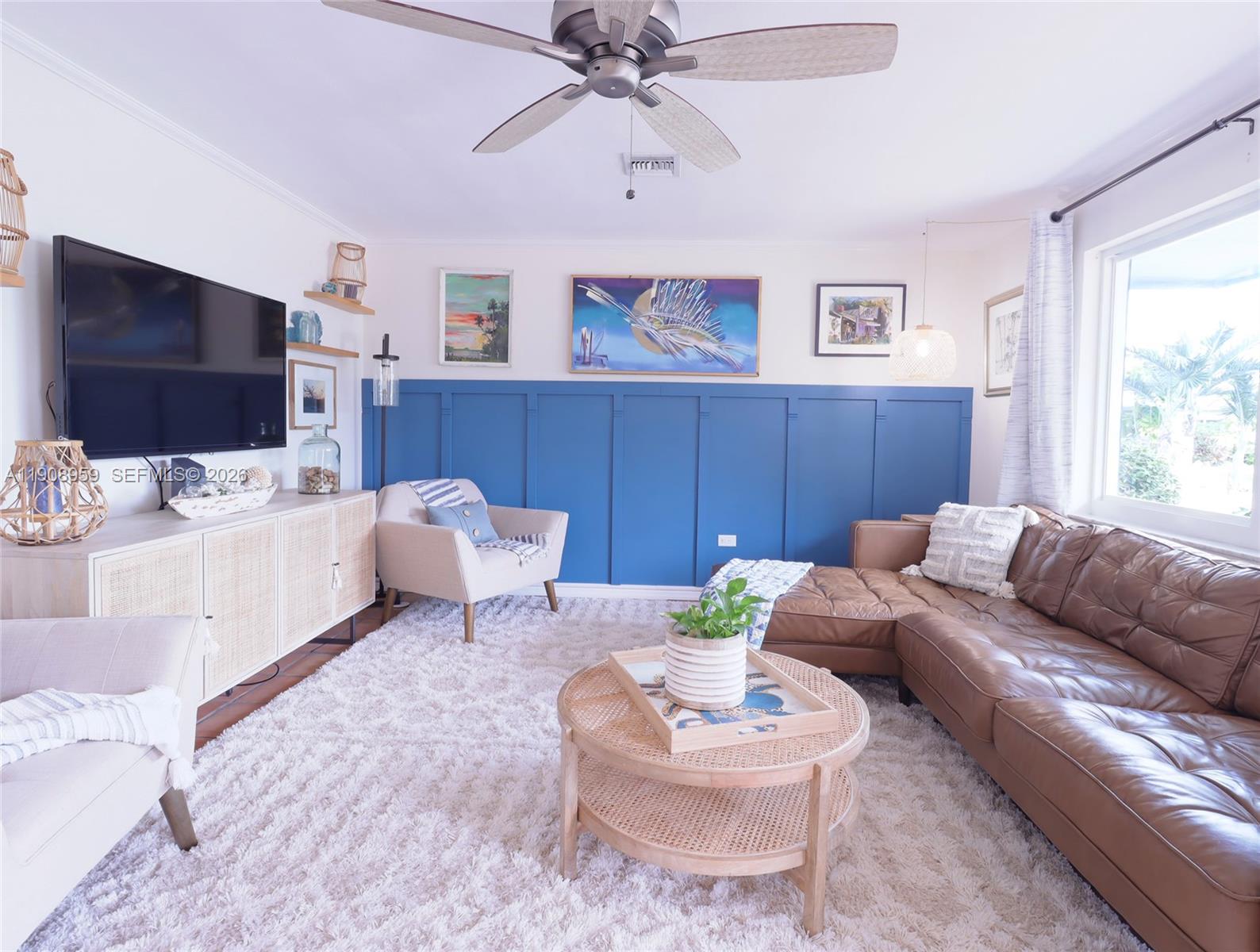 160 Ridge Street Tavernier, FL 33070 - Photo 5 of 24 a living room with furniture and a large window