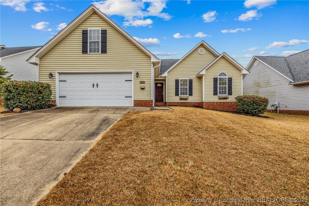 a front view of a house with yard