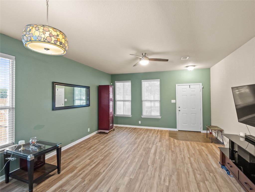 102 Wisteria Way San Marcos, TX 78666 - Photo 12 of 29 a furnished livingroom with a window