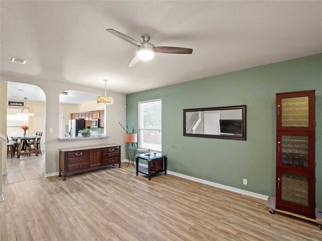 102 Wisteria Way San Marcos, TX 78666 - Photo 13 of 29 a living room with furniture and a wooden floor