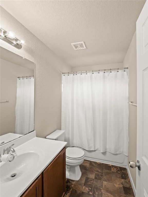 102 Wisteria Way San Marcos, TX 78666 - Photo 20 of 29 a bathroom with a sink a toilet and shower