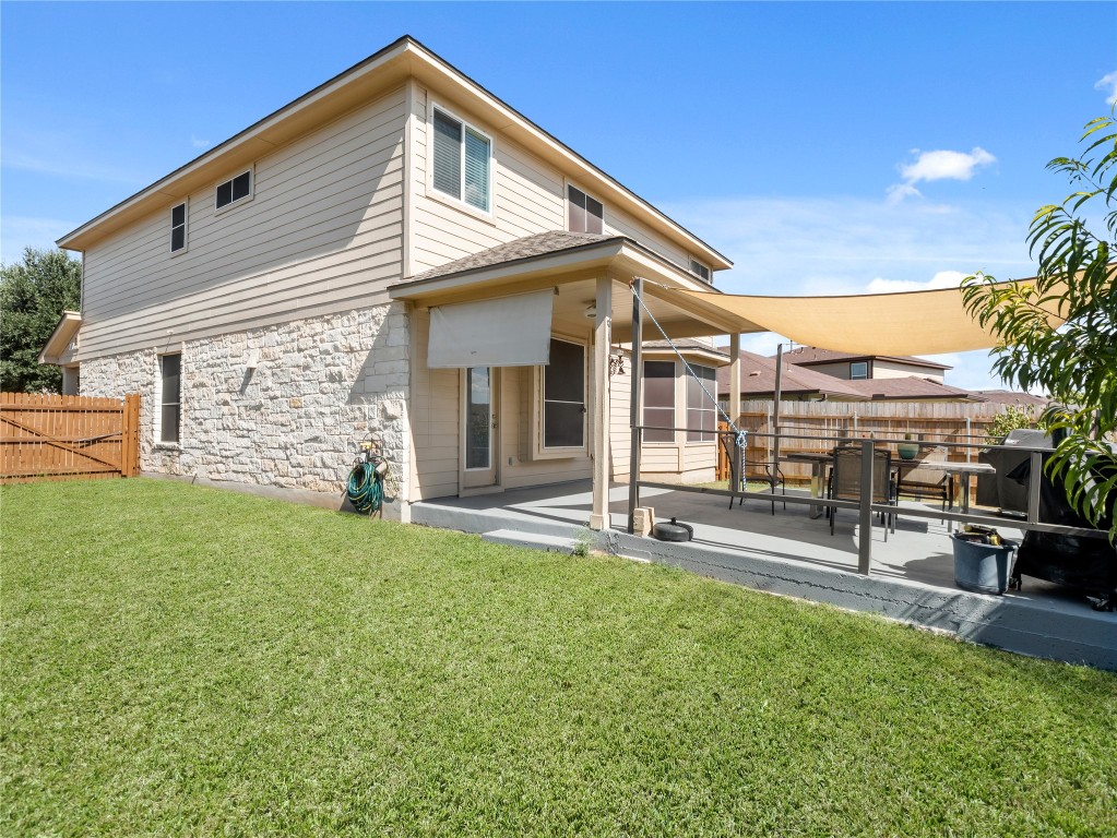 102 Wisteria Way San Marcos, TX 78666 - Photo 24 of 29 a view of a house with backyard and sitting area