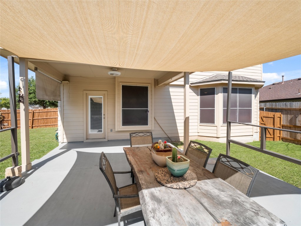 102 Wisteria Way San Marcos, TX 78666 - Photo 25 of 29 a view of a patio with couches chairs and potted plants