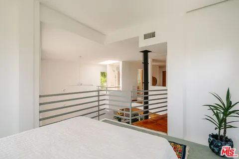 a view of a room with wooden walls