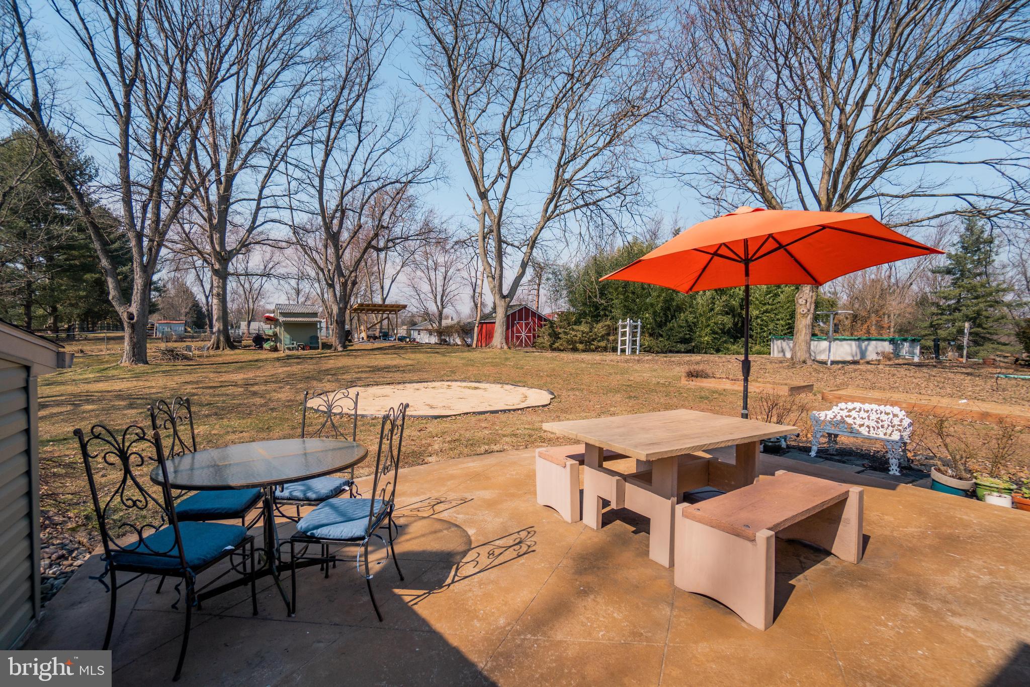 334 Schoolhouse Road Pottstown, PA 19465 - Photo 5 of 40 Patio overlooking beautiful backyard