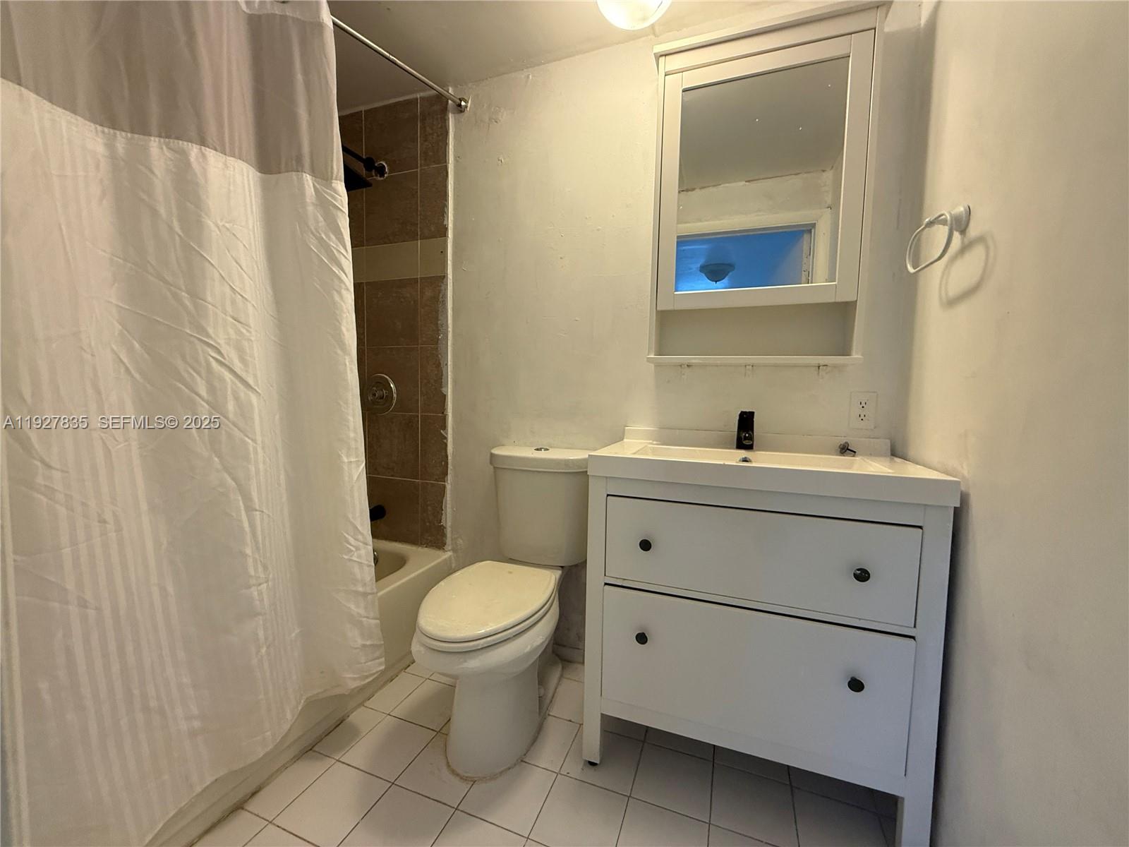 301 North 70th Avenue Hollywood, FL 33024 - Photo 7 of 14 a bathroom with a sink toilet and shower
