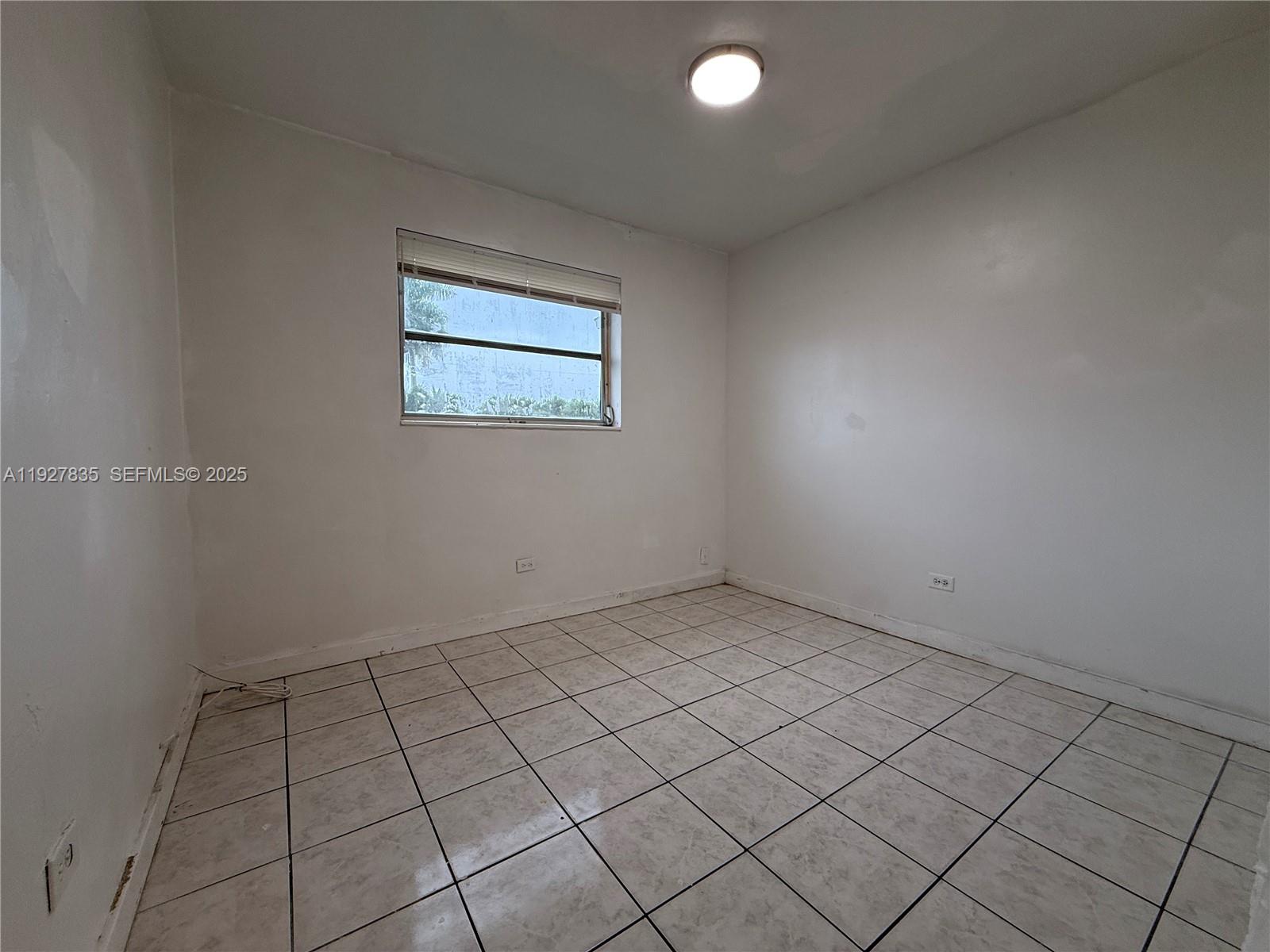 301 North 70th Avenue Hollywood, FL 33024 - Photo 9 of 14 an empty room with white walls