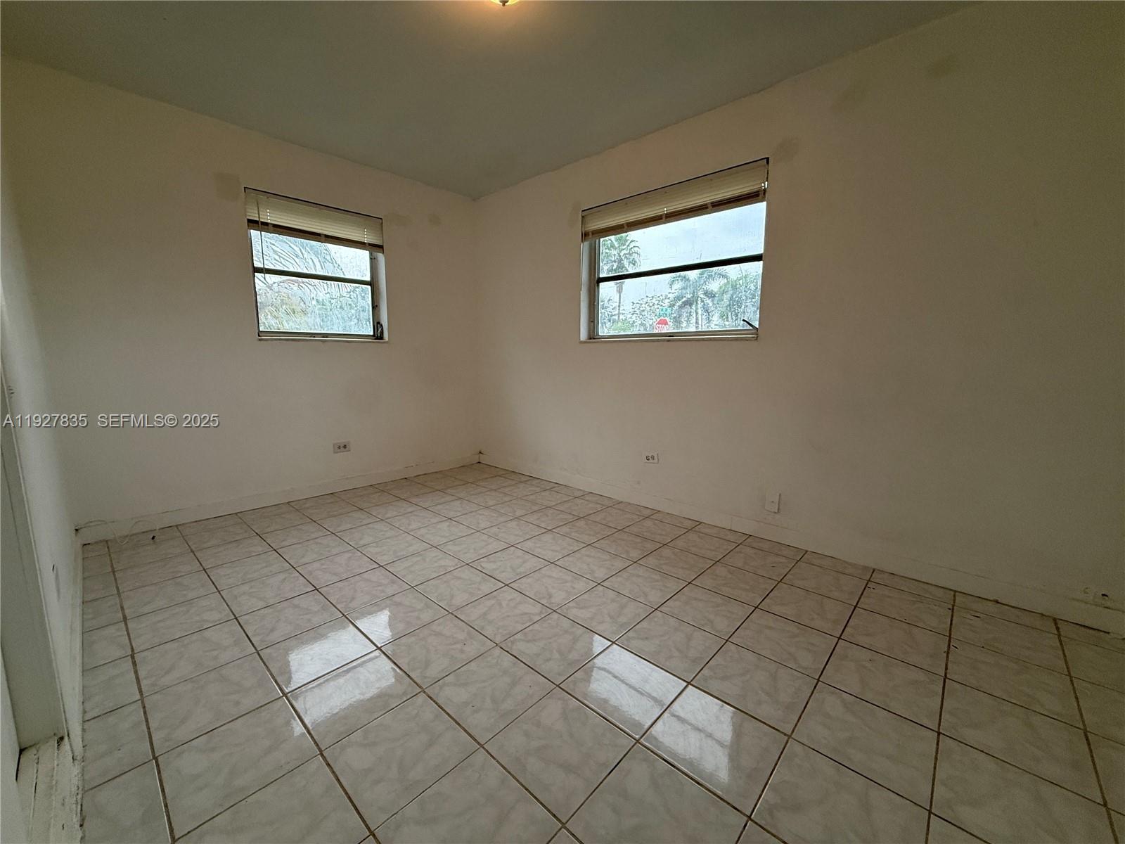 301 North 70th Avenue Hollywood, FL 33024 - Photo 10 of 14 a view of a room that has a window in it