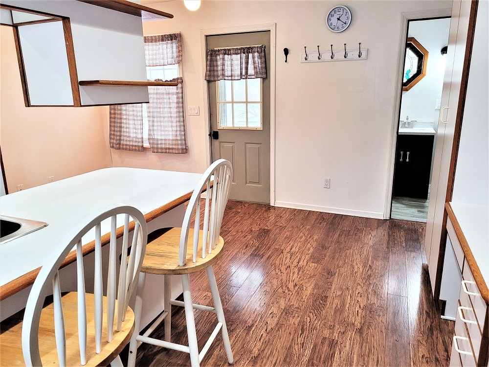 1002 Chestnut Avenue Dixon, IL 61021 - Photo 11 of 30 a view of a room with furniture window and wooden floor
