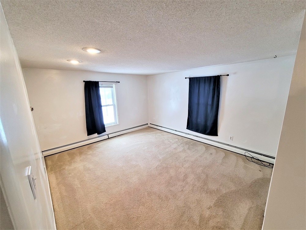 1002 Chestnut Avenue Dixon, IL 61021 - Photo 16 of 30 wooden floor in an empty room with a window