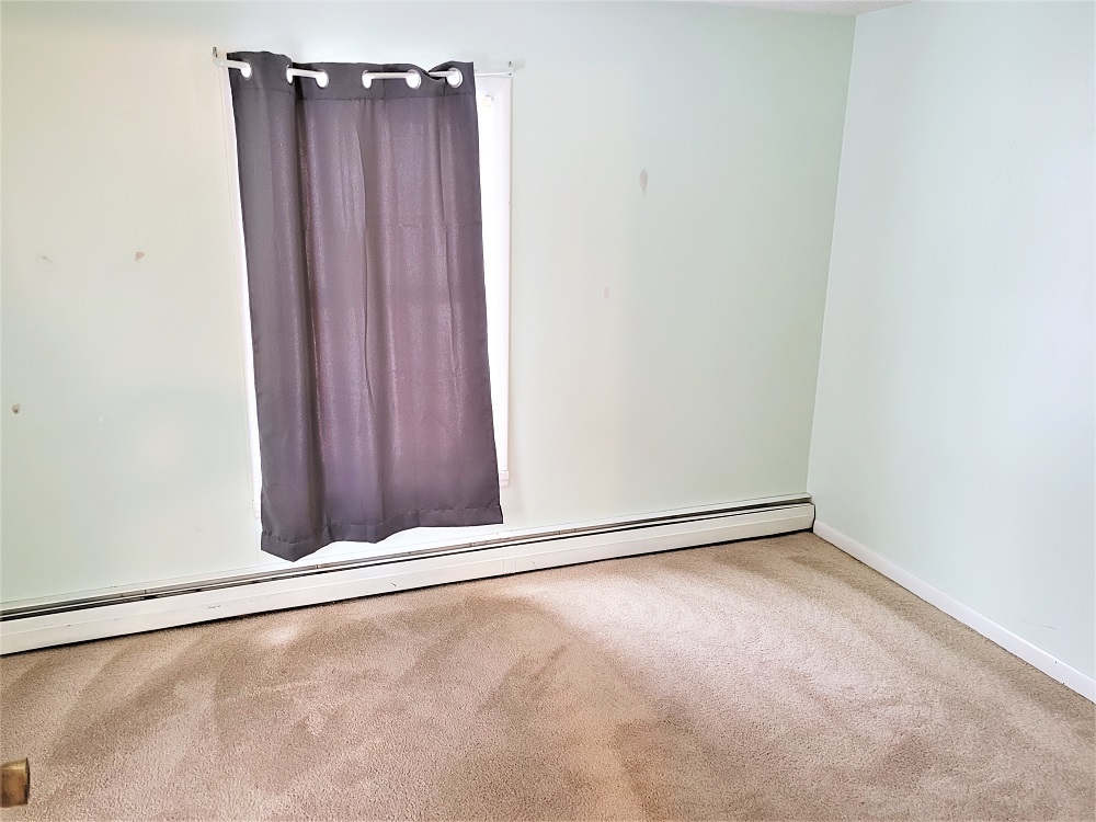 1002 Chestnut Avenue Dixon, IL 61021 - Photo 18 of 30 an empty room with wooden floor