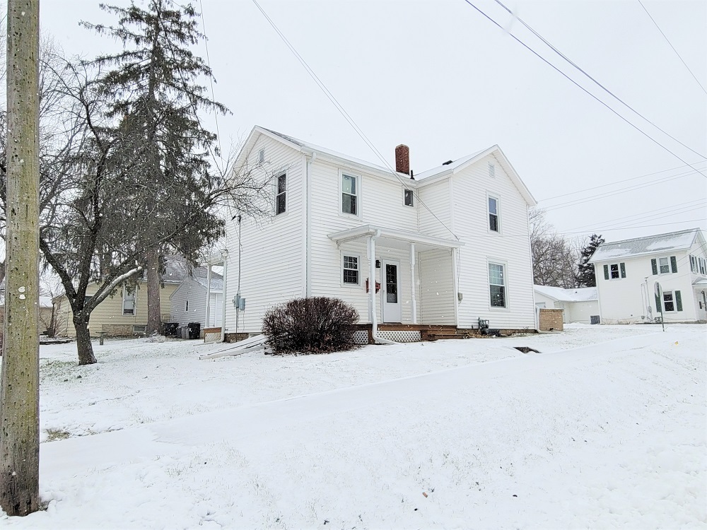 1002 Chestnut Avenue Dixon, IL 61021 - Photo 29 of 30 a view of a white house in snow