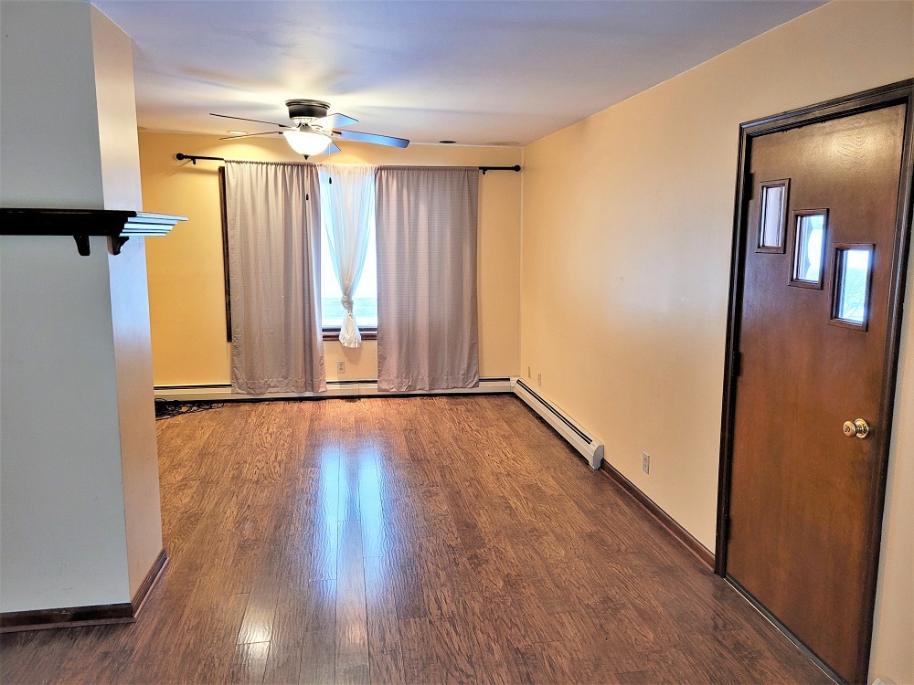 1002 Chestnut Avenue Dixon, IL 61021 - Photo 3 of 30 a view of a room with wooden floor