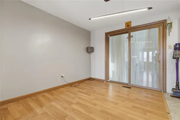 a kitchen with stainless steel appliances granite countertop a refrigerator oven a sink dishwasher and a refrigerator