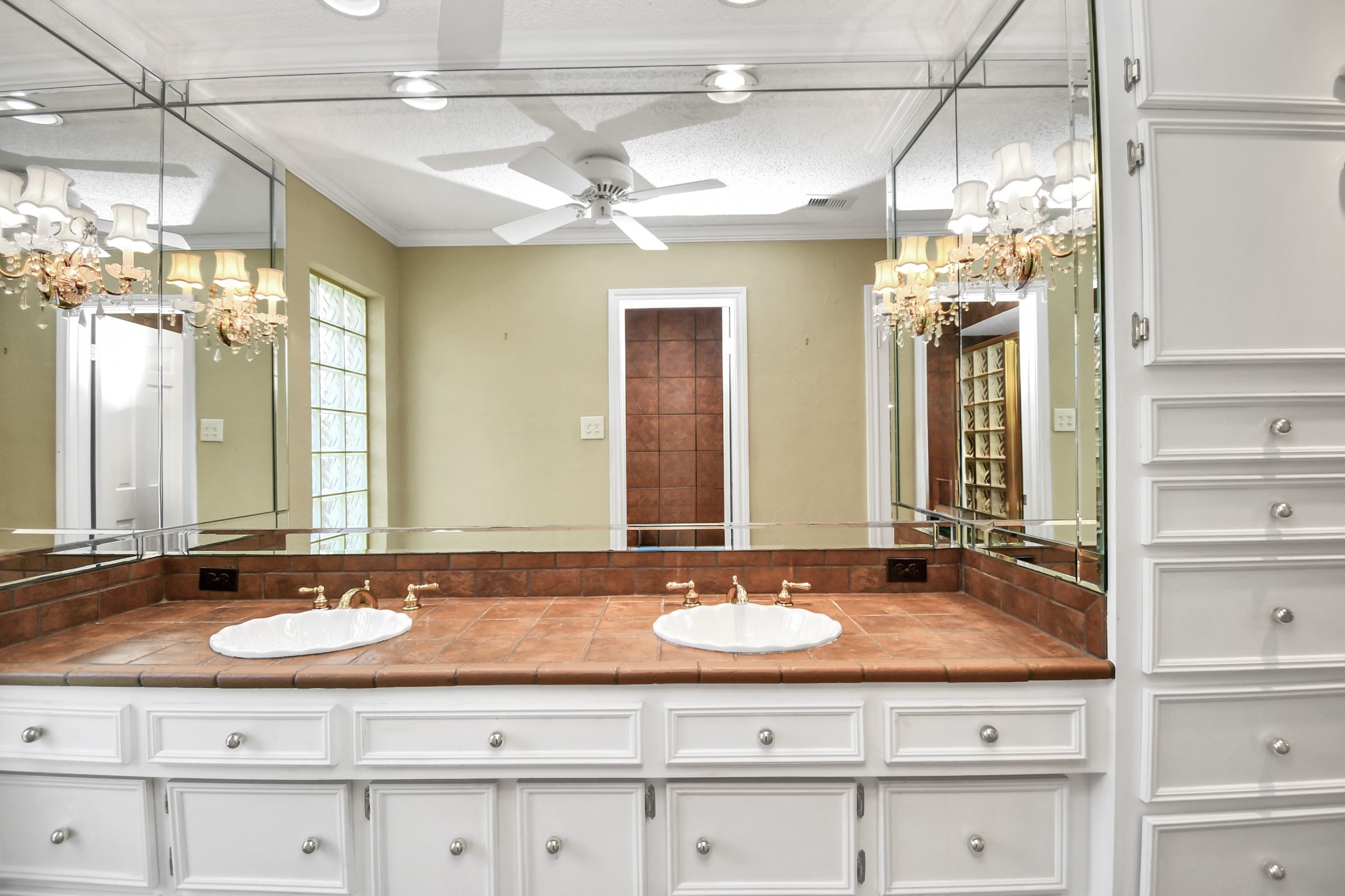 3114 Audubon Court Sugar Land, TX 77478 - Photo 15 of 29 a bathroom with a sink double vanity and a mirror