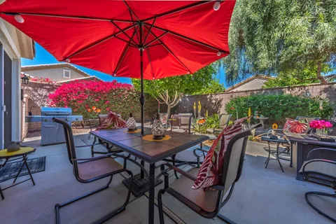 a view of a back yard of the house