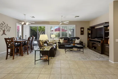a view of a livingroom with furniture window and outside view