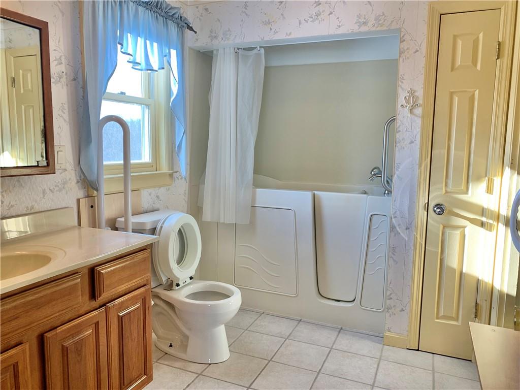 1257 Amity Ridge Road Amity, PA 15311 - Photo 13 of 21 a bathroom with a sink a toilet and a mirror