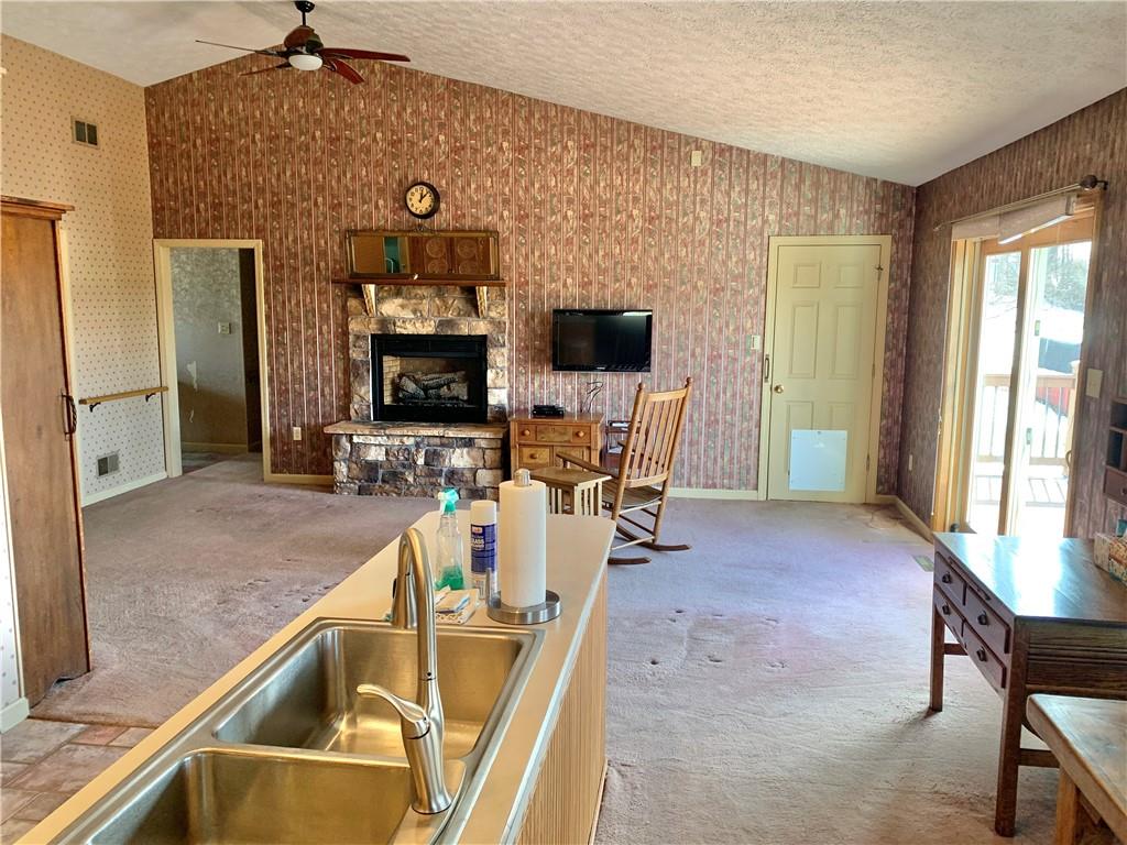 1257 Amity Ridge Road Amity, PA 15311 - Photo 6 of 21 a view of a living room and a flat screen tv