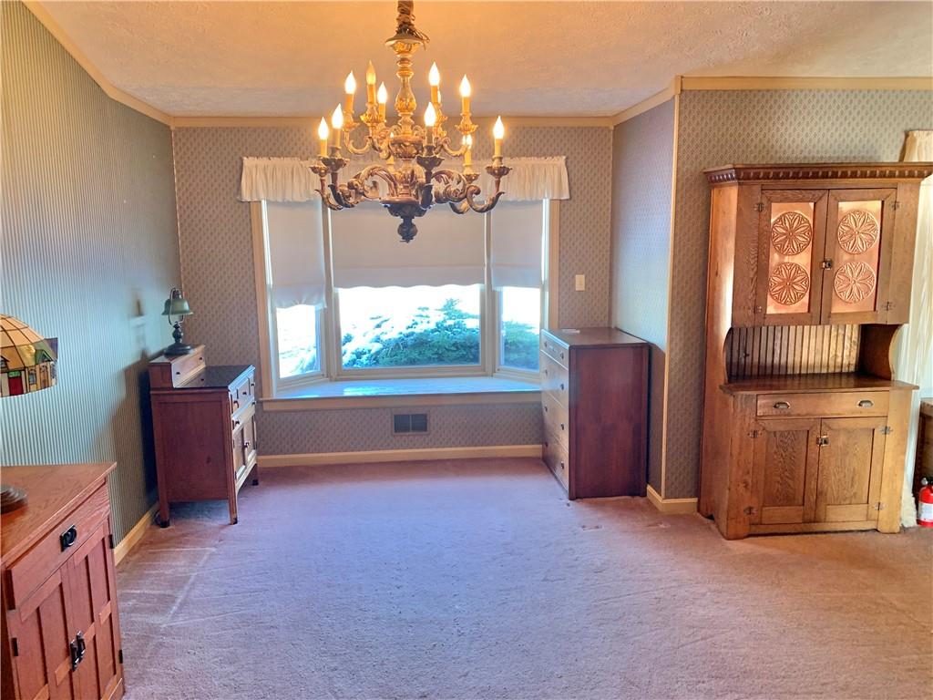 1257 Amity Ridge Road Amity, PA 15311 - Photo 7 of 21 a living room with furniture and a chandelier