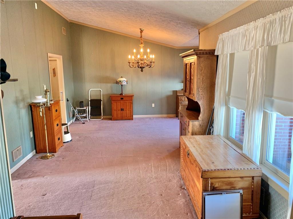 1257 Amity Ridge Road Amity, PA 15311 - Photo 8 of 21 a view of a room with furniture and a chandelier