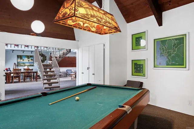 a room with furniture and a flat screen tv