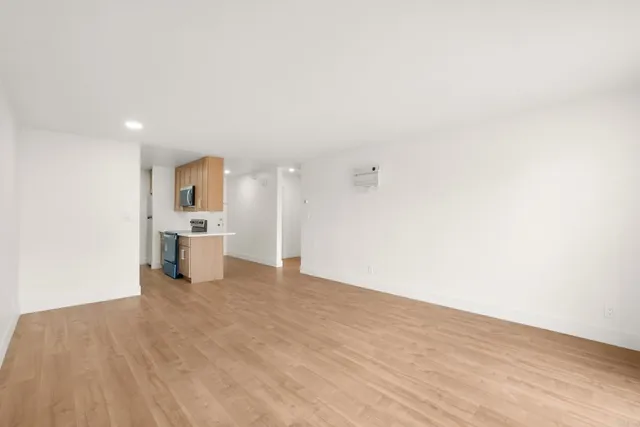 a view of a kitchen with a sink