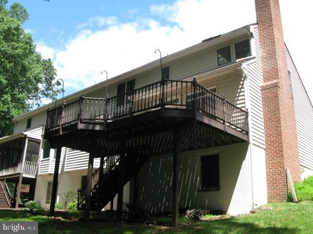 9719 Deep Smoke Columbia, MD 21046 - Photo 2 of 31 Rear of house with deck