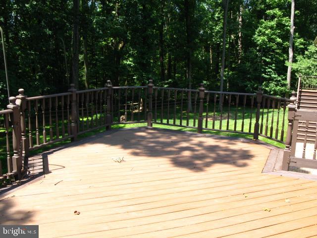 9719 Deep Smoke Columbia, MD 21046 - Photo 12 of 31 Rear deck with man-made flooring