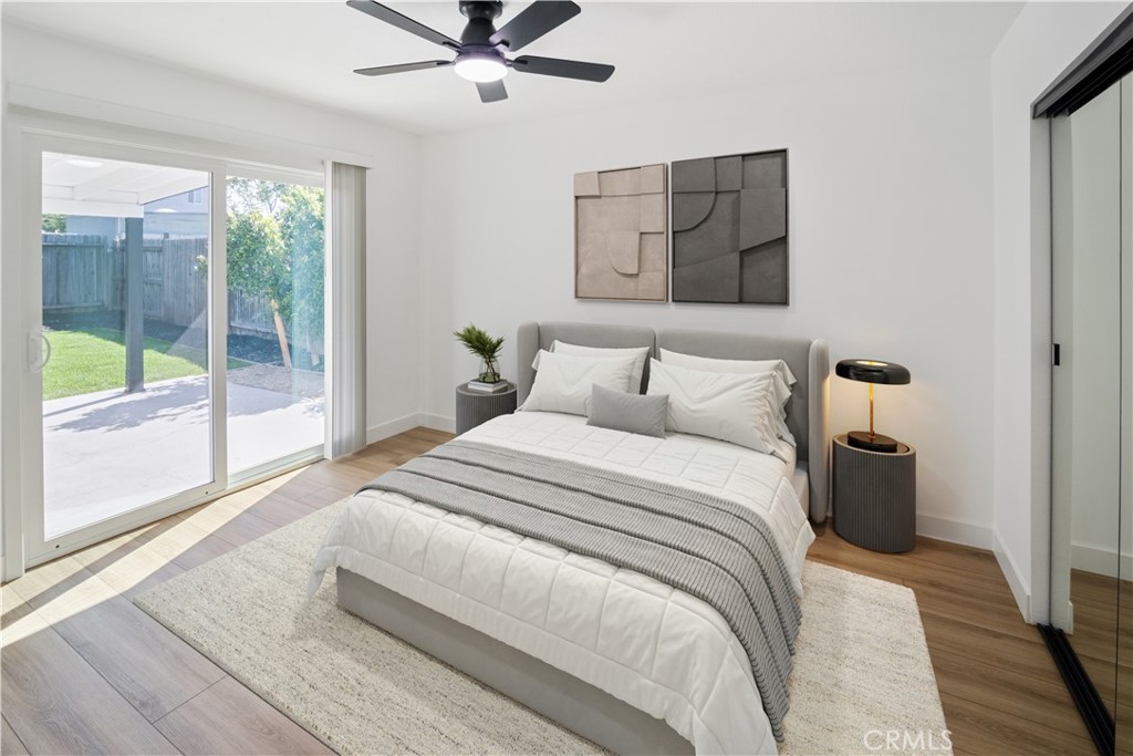 11452 Earlham Street Orange, CA 92869 - Photo 15 of 30 a bedroom with a bed and window