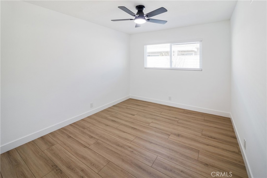 11452 Earlham Street Orange, CA 92869 - Photo 19 of 30 wooden floor in an empty room with a window