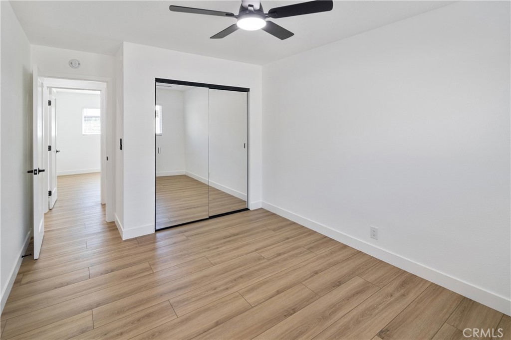 11452 Earlham Street Orange, CA 92869 - Photo 20 of 30 wooden floor in an empty room with a window