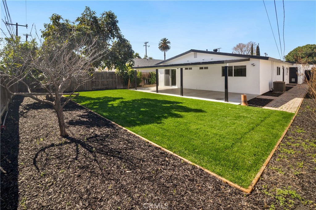 11452 Earlham Street Orange, CA 92869 - Photo 26 of 30 a front view of a house with a yard