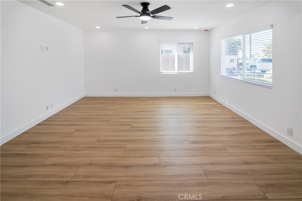 11452 Earlham Street Orange, CA 92869 - Photo 5 of 30 wooden floor in an empty room with a window