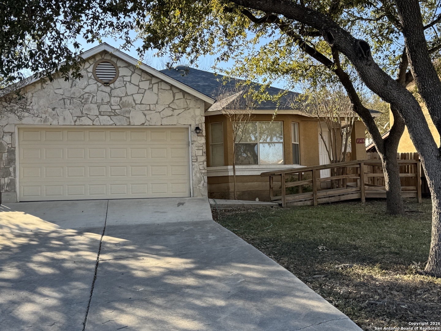 7315 Northallerton Converse, TX 78109 - Photo 2 of 22 a front view of a house with a yard and garage