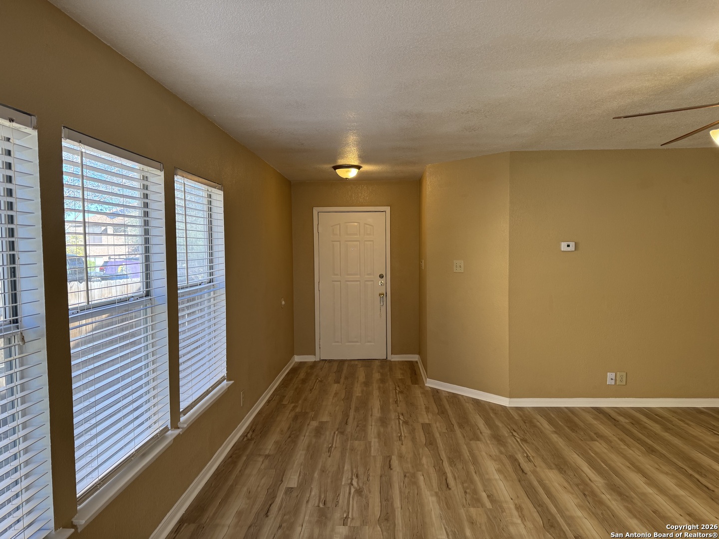 7315 Northallerton Converse, TX 78109 - Photo 4 of 22 a view of a room with wooden floor and a window